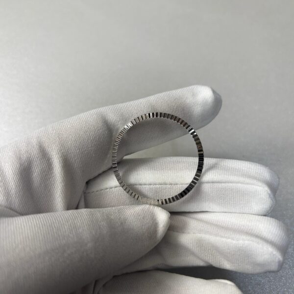 Bezel with markings of Tissot Titoni 777