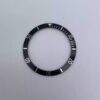 Tudor T-397 "Little Red Flower" aluminum bezel insert with scale markings.