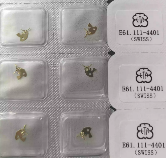 Swiss Original ETA E61.111 Movement Parts: Negative Plate, Stem, Electronic Retaining Clip, Clutch Wheel