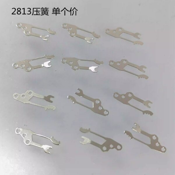 Citizen 2813/8205: Bearing Quick-Set U-Spring, Setting Lever Bridge Spring, Clutch Lever, Date Quick-Set Spring, Pin, Second Spring