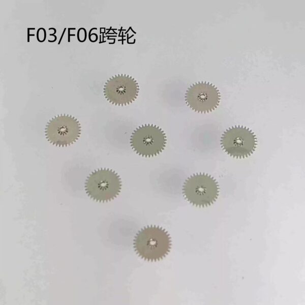 7 Swiss F03.111 / F06.111 Movement - Clutch Wheel, Date Wheel, Date Disc, Intermediate Wheel, Third Wheel, Day Disc, Stem and Stem Core